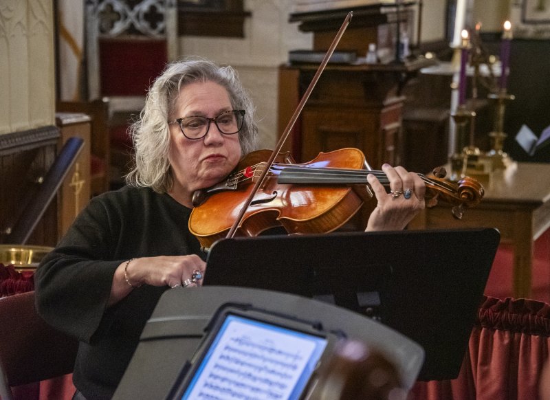 Diane Baxter Neutzling on viola performs a sonata.
